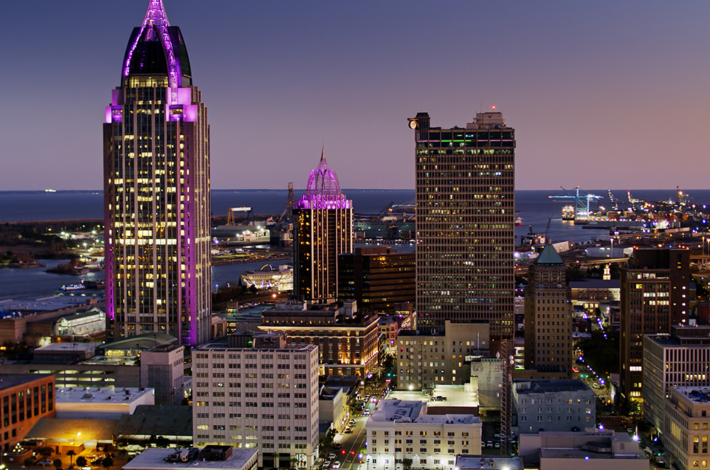 The Downtown of Mobile with Port and Bay Beyond at Twilight